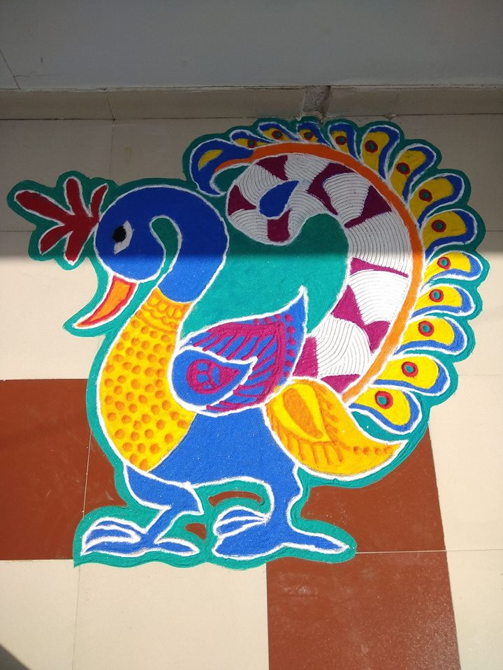 Simple Rangoli design images  on peacock theme