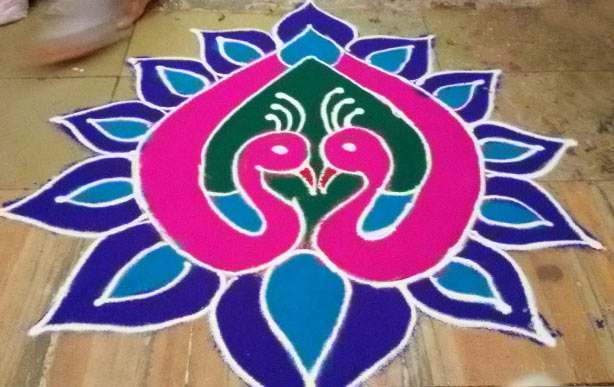 Simple Rangoli design images with peacock theme