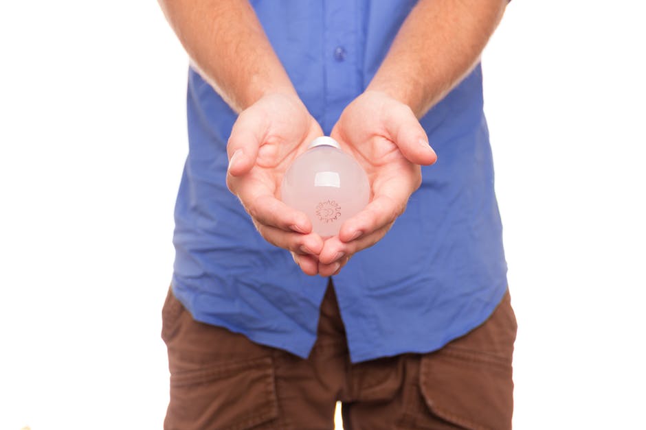 Download Bulb in hand stock photography images hd